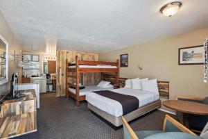 Ένα ή περισσότερα κρεβάτια σε δωμάτιο στο Birch Glen Hotel