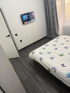 Ένα ή περισσότερα κρεβάτια σε δωμάτιο στο Ama Residence