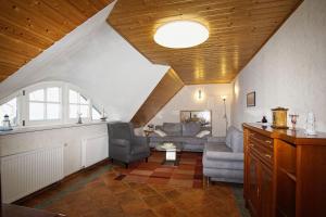 Χώρος καθιστικού στο Ferienhaus Strandlatscher Ferienwohnung 03