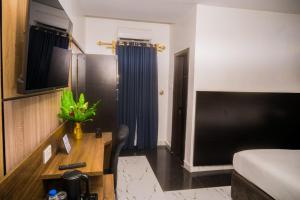 TV o dispositivi per l'intrattenimento presso City Base Hotel, Port Harcourt
