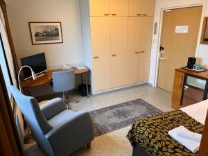 TV a/nebo společenská místnost v ubytování Budget Hotel Easystay