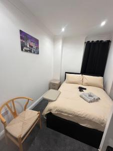 Кровать или кровати в номере Central London Room