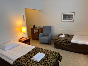 Postel nebo postele na pokoji v ubytování Budget Hotel Easystay