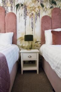 Letto o letti in una camera di The Monks Quarters