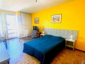 Posteľ alebo postele v izbe v ubytovaní Studio climatisé à Amélie-les-Bains, 2 personnes, parking, proche des Thermes - FR-1-703-20