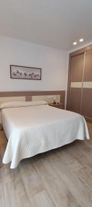Posteľ alebo postele v izbe v ubytovaní Hostal Internacional