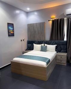 Letto o letti in una camera di 99 MOZILLA APARTMENTS AND SUITES