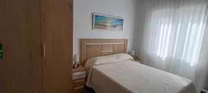 Posteľ alebo postele v izbe v ubytovaní Hostal Internacional