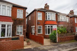 Bygningen som feriehuset ligger i