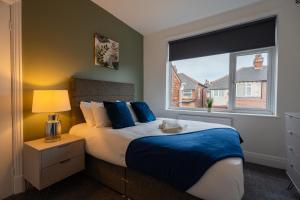 En eller flere senge i et værelse på Buckingham House Horizon Stays