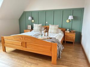 Letto o letti in una camera di Weingut Winzerzimmer Rothschädl