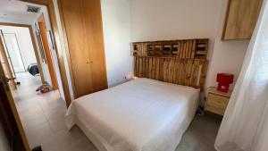 Postel nebo postele na pokoji v ubytování Apartamento acogedor con piscina en Santa Margarita + 25 fotografií