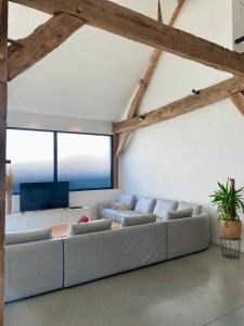 Posezení v ubytování Hoeve De Kleinheide
