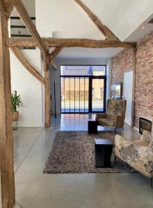 Posezení v ubytování Hoeve De Kleinheide