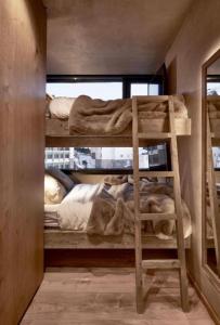 Palanda nebo palandy na pokoji v ubytování Penthouse Nevado - Apartments with 360 view