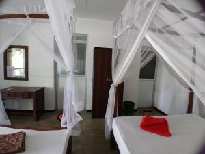 Letto o letti in una camera di Abinu"s Place