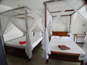 Letto o letti in una camera di Abinu"s Place