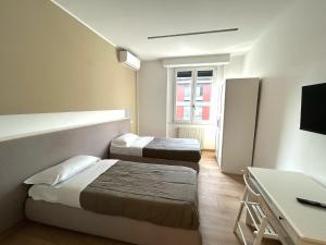 Posteľ alebo postele v izbe v ubytovaní Parea House 1