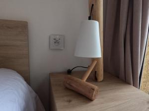 Postel nebo postele na pokoji v ubytování chambre 2 personnes Pinet
