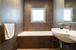Koupelna v ubytování Résidence Luxe avec Plage Privée