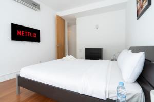 Postel nebo postele na pokoji v ubytování Résidence Luxe avec Plage Privée