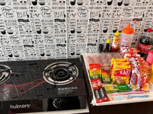 a refrigerator full of food and drinks in front of a wall at 1br 2pax 1car only Malaysian guest only in Bayan Lepas +40 photos