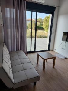 Khu vực ghế ngồi tại Studio Cosy - Proche MEETT 300m