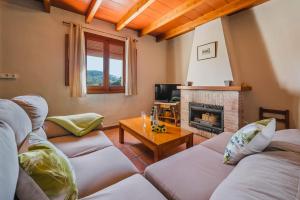 A seating area at Villa Vinyes by Villa Plus