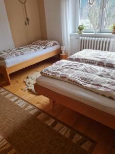 Postel nebo postele na pokoji v ubytování Apartmán AZ