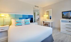 Postelja oz. postelje v sobi nastanitve The Wave Hotel Condado