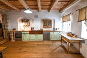 Kuchyň nebo kuchyňský kout v ubytování Boutique Apartman Mikulov