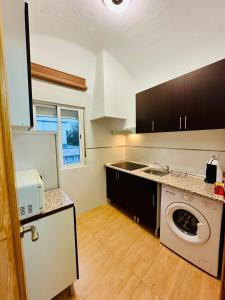 Kuchyňa alebo kuchynka v ubytovaní Apartamentos Jamé Mérida