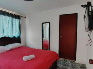 Hotel Montecarlo Suite客房内的一张或多张床位