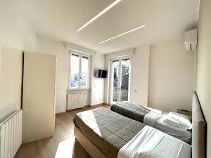 Posteľ alebo postele v izbe v ubytovaní Parea House 1