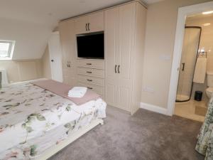Postel nebo postele na pokoji v ubytování Gweedore Homestead