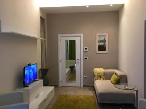 TV a/nebo společenská místnost v ubytování Taloshospitality
