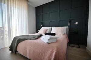 Ένα ή περισσότερα κρεβάτια σε δωμάτιο στο Cliff Edge Apartment in Xaghra
