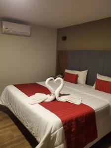 Postel nebo postele na pokoji v ubytování Hotel Granada