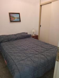 Ένα ή περισσότερα κρεβάτια σε δωμάτιο στο El descnso