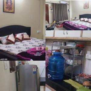 Ένα ή περισσότερα κρεβάτια σε δωμάτιο στο Moksha Home-Stay