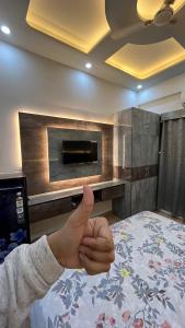 Voodi või voodid majutusasutuse Comfy Studio Apartment 5 mins from Expo Mart toas