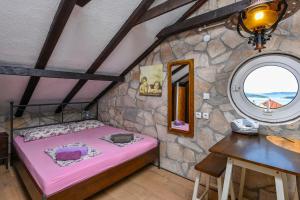 Posteľ alebo postele v izbe v ubytovaní Apartments Villa ViDa Orebić