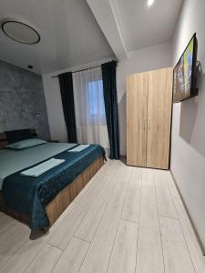 Vila Kalibu 1客房内的一张或多张床位
