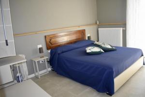Postel nebo postele na pokoji v ubytování Il Trovatore Rooms
