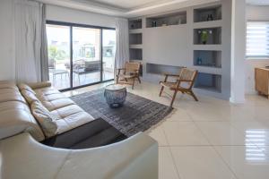 Posezení v ubytování Beachfront Heaven Apartment Flic en Flac 2