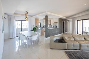 Posezení v ubytování Beachfront Heaven Apartment Flic en Flac 2