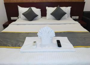 Krevet ili kreveti u jedinici u okviru objekta Hotel Shiv shakti residency