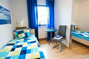 Ein Bett oder Betten in einem Zimmer der Unterkunft Ferienhaus: Familienunterkunft bis zu 12 Personen - [#125273]