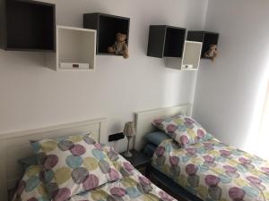 Posteľ alebo postele v izbe v ubytovaní Residence Muna 3055