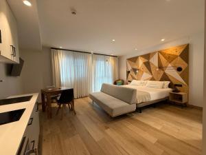 Postel nebo postele na pokoji v ubytování Apartahotel Dos Ríos Ainsa + 37 fotografií
